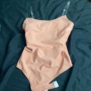pink bodysuit